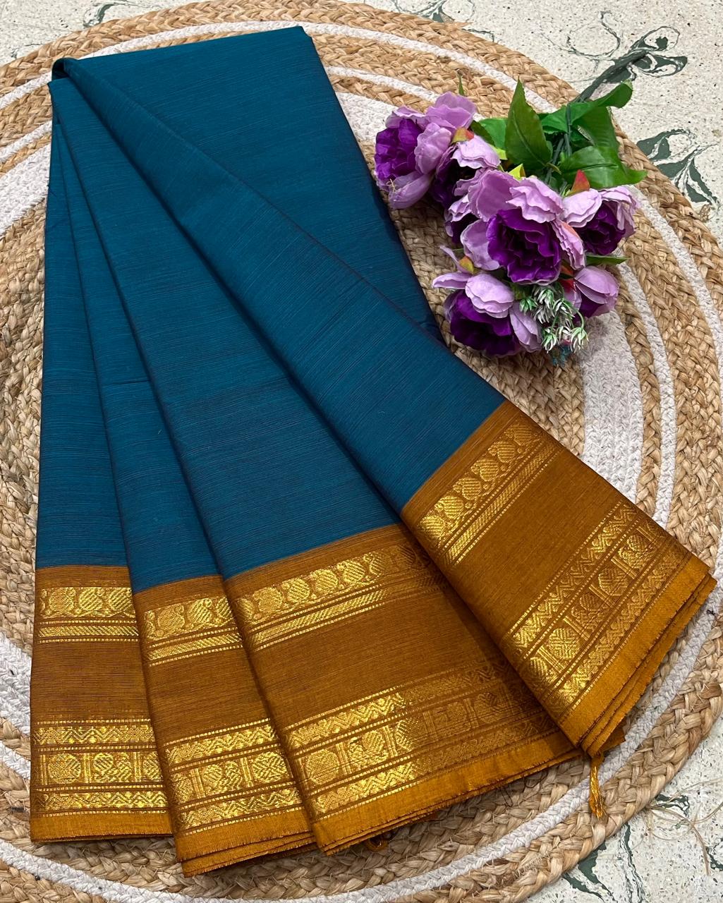Teal Blue Kanchi Cotton Saree With Rich Golden Zari Border